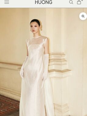 Huong Merrily Dress . Ivory Satin Evening Dress. Size M. No gloves come with.